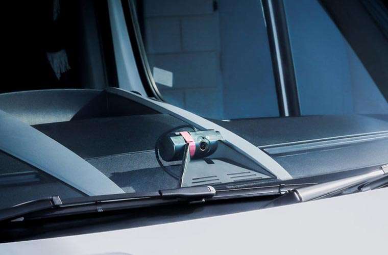 surecam-forward-facing-camera-installed-on-dashboard-of-a-white-van